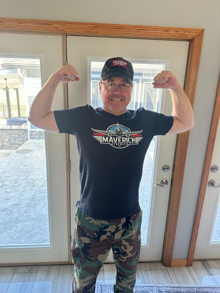 Maverick Strength Co. client showing enthusiasm for strength training